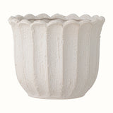 Small ribbed plant pot in white reactive glaze stoneware effect.