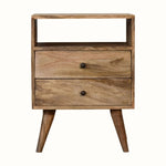 Square shaped wooden bedside in natural finish, with two drawers an an open slot shelf.