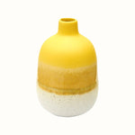 Bud vase in yellow reactive glaze with white stoneware dipped effect.