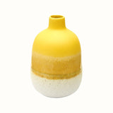 Bud vase in yellow reactive glaze with white stoneware dipped effect.