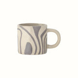 Grey and neutral glazed mug with a retro swirl pattern and small handle.