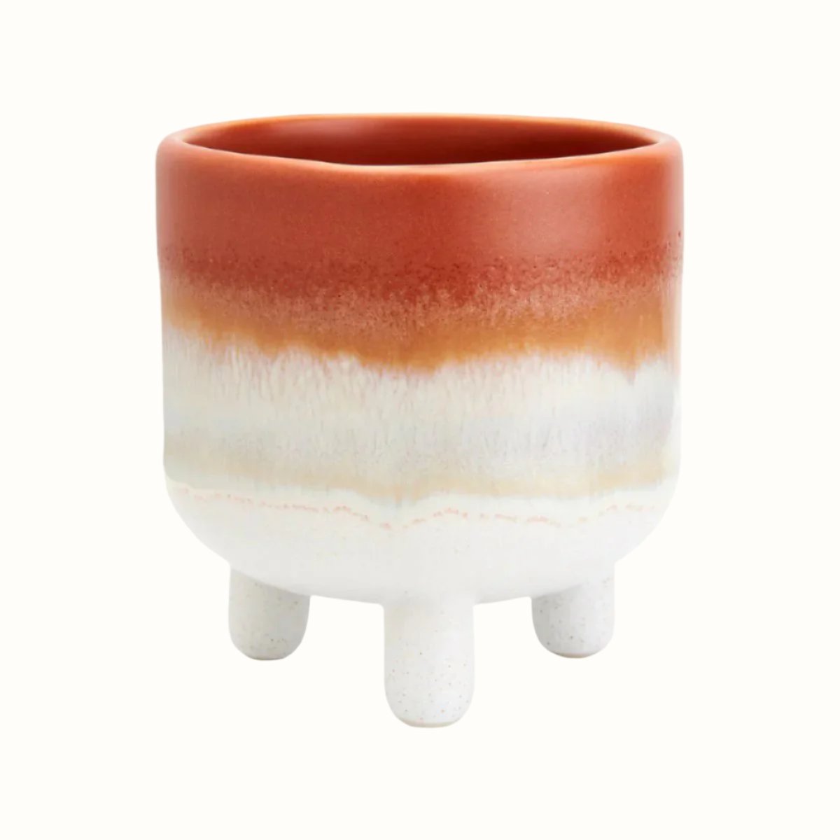 Mini plant pot in terracotta glaze and dipped white stoneware effect.